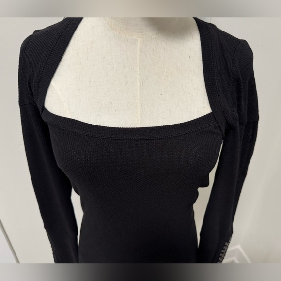 Free People - Woman’s Black top with detail on sleeves
(Listing #43) - Picture 2 of 9